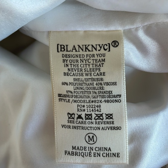 Blank NYC White Faux Leather Motorcycle Jacket with Floral Print - Picture 11 of 12